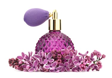 Photo of Bottle of luxury perfume and lilac flowers isolated on white