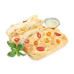 Photo of Cut delicious focaccia with tomatoes, basil and oil isolated on white