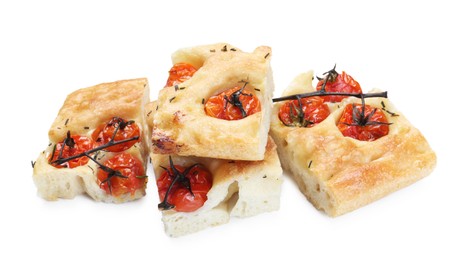 Photo of Pieces of delicious focaccia with tomatoes and spices isolated on white