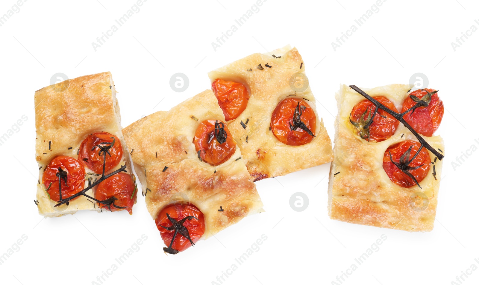 Pieces of delicious focaccia with tomatoes and spices isolated on white, top view Photo of Pieces of delicious focaccia with tomatoes and spices isolated on white, top view