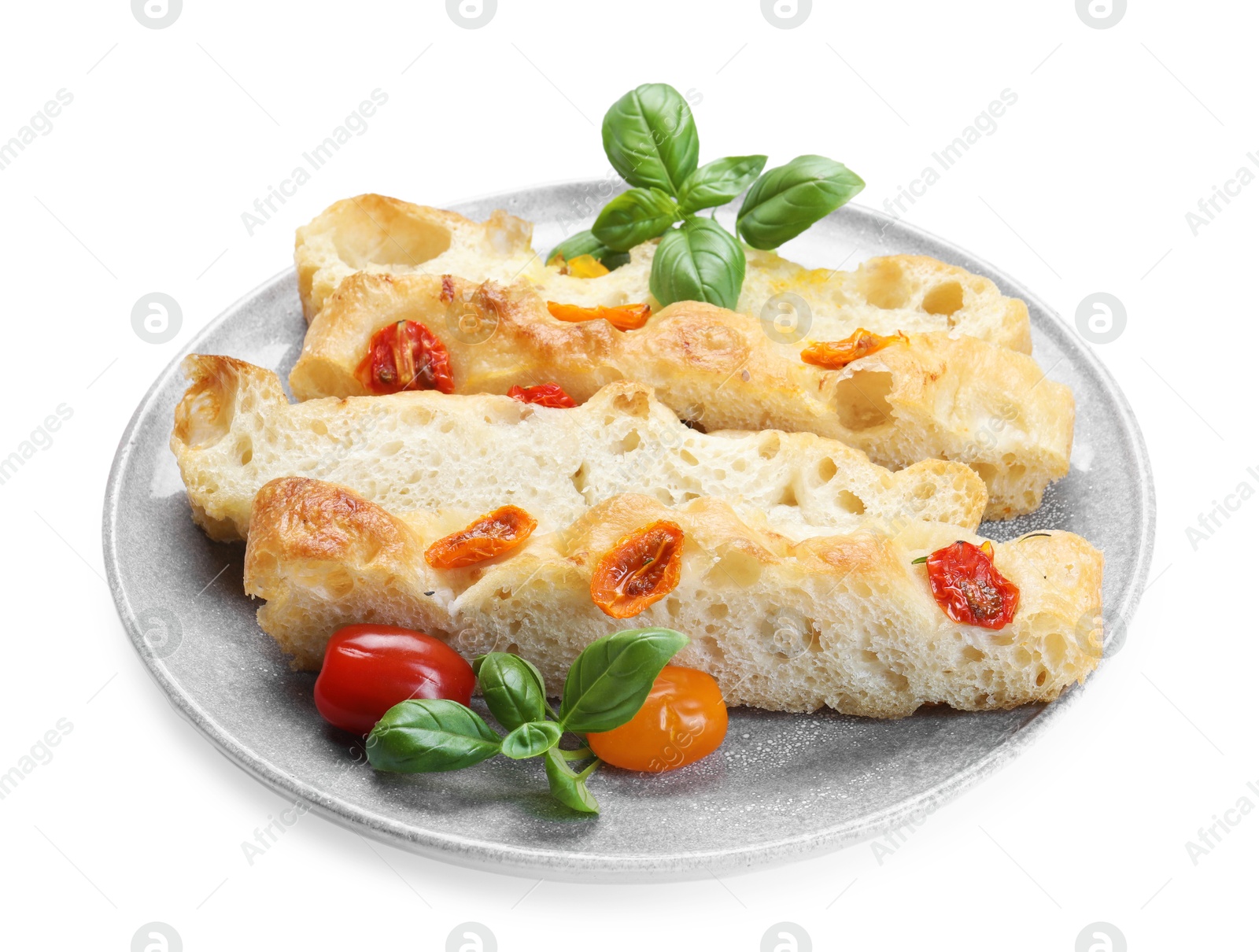 Pieces of delicious focaccia with tomatoes and basil isolated on white Photo of Pieces of delicious focaccia with tomatoes and basil isolated on white