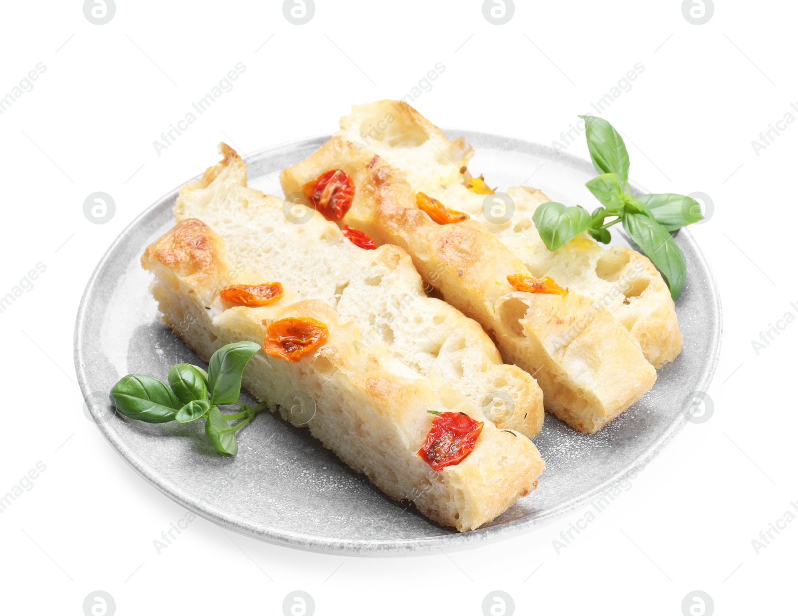 Pieces of delicious focaccia with tomatoes and basil isolated on white Photo of Pieces of delicious focaccia with tomatoes and basil isolated on white