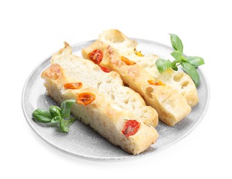 Photo of Pieces of delicious focaccia with tomatoes and basil isolated on white