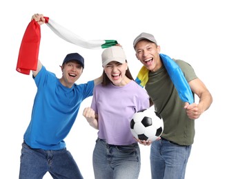 Photo of Emotional sports fans with flags and soccer ball on white background