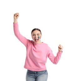 Photo of Emotional sports fan with drawing of Italian flag on white background