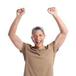 Photo of Emotional sports fan with drawing of Italian flag on white background
