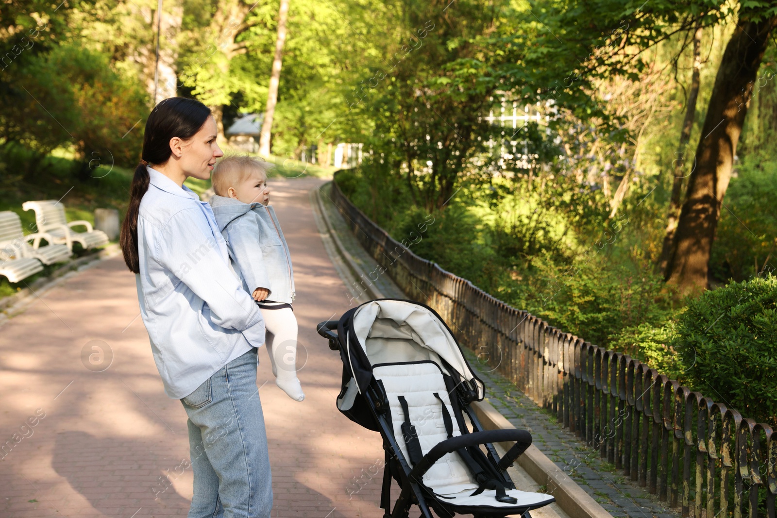 Mother with her cute baby in park Photo of Mother with her cute baby in park