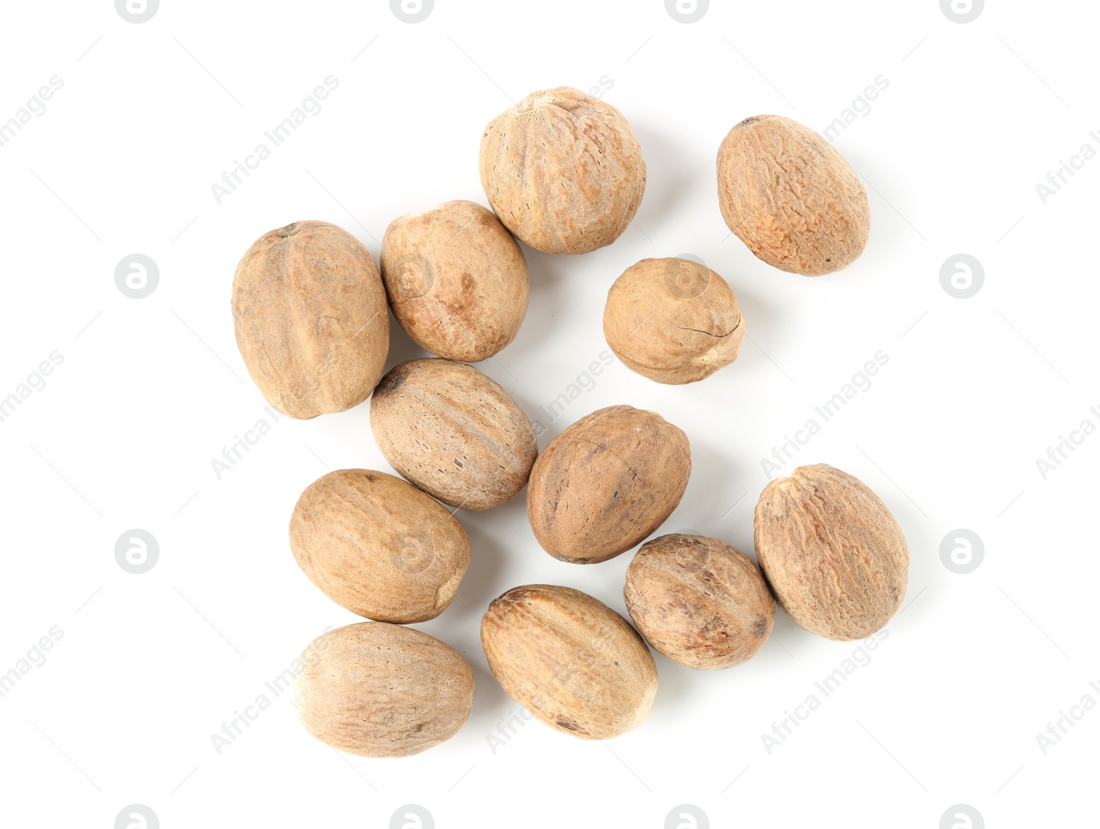 Fresh nutmegs isolated on white, top view Photo of Fresh nutmegs isolated on white, top view