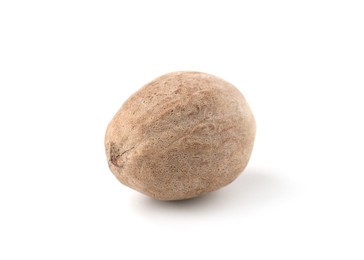 Photo of One whole fresh nutmeg isolated on white