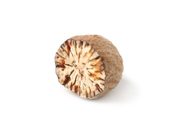 Photo of Half of fresh nutmeg isolated on white