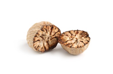 Photo of Halves of fresh nutmeg isolated on white
