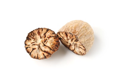 Photo of Halves of fresh nutmeg isolated on white, above view