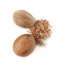 Photo of Whole nutmegs and powder isolated on white, top view