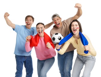 Photo of Emotional sports fans with flags and soccer ball on white background