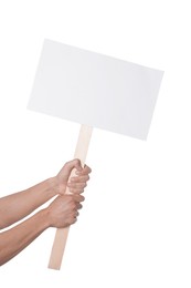 Photo of Man holding blank sign on white background, closeup. Mockup for design