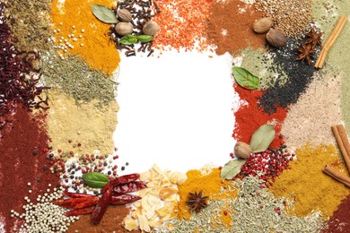 Photo of Different aromatic spices isolated on white, top view
