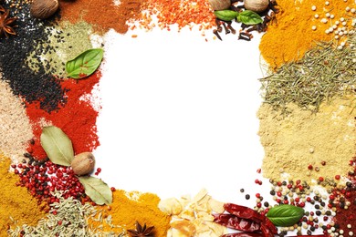 Photo of Different aromatic spices isolated on white, top view
