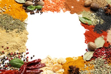 Photo of Different aromatic spices isolated on white, top view