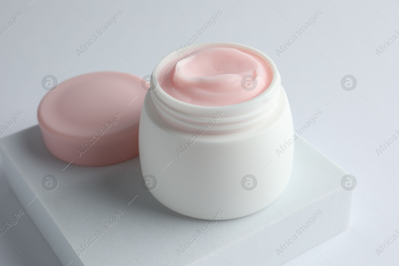 Jar of moisturizing body cream on white background, closeup Photo of Jar of moisturizing body cream on white background, closeup