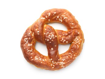 Photo of Tasty pretzel with salt isolated on white, top view