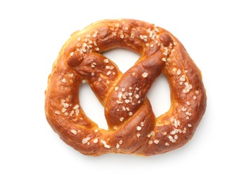 Photo of Tasty pretzel with salt isolated on white, top view