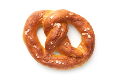 Photo of Tasty pretzel with salt isolated on white, top view