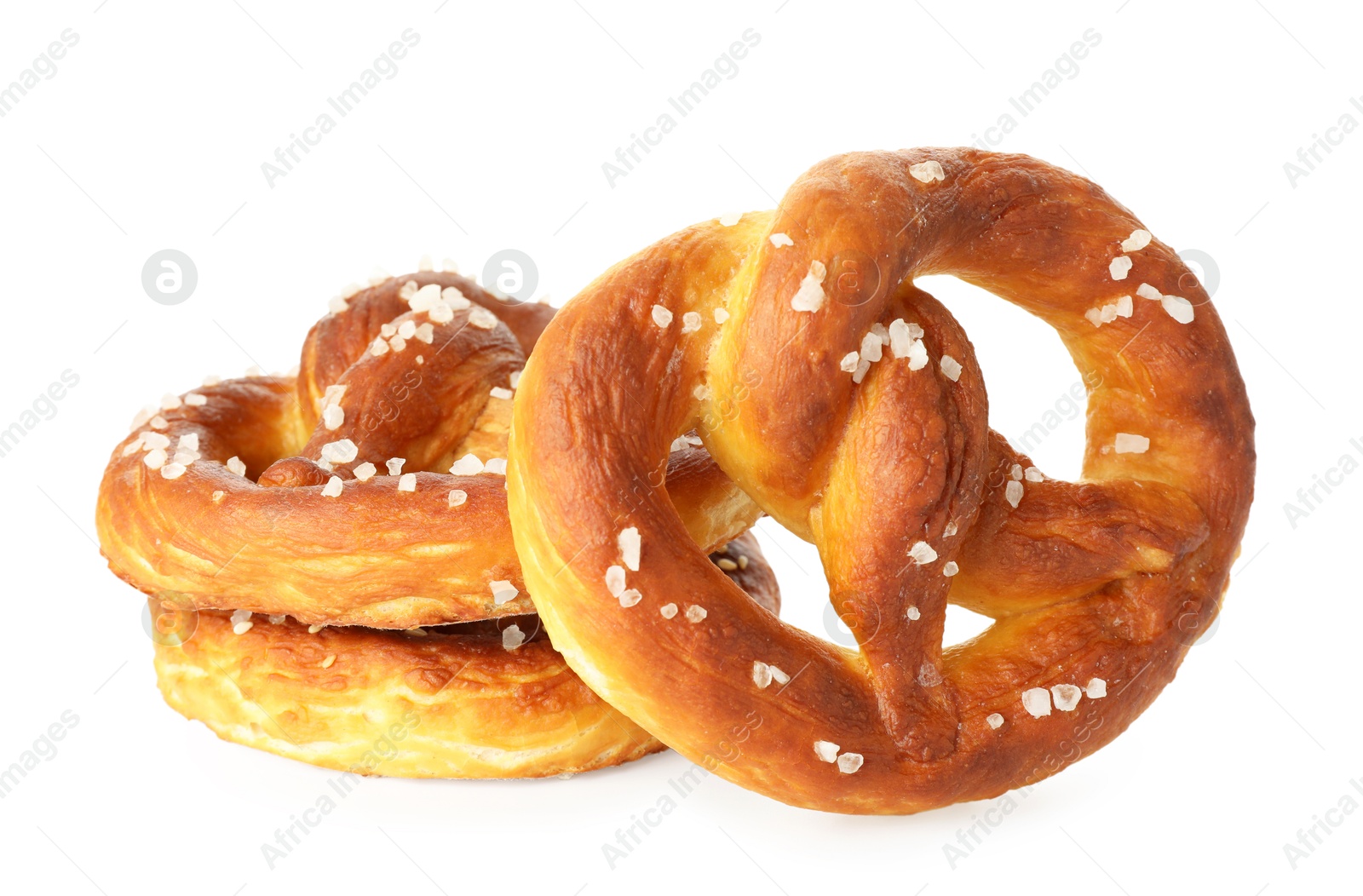 Tasty pretzels with salt isolated on white Photo of Tasty pretzels with salt isolated on white