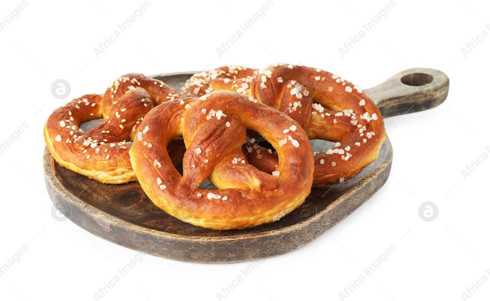 Tasty pretzels with salt isolated on white Photo of Tasty pretzels with salt isolated on white