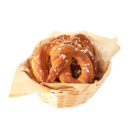 Photo of Tasty pretzels with salt in wicker basket isolated on white