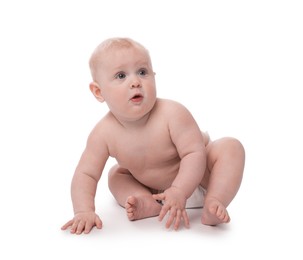 Photo of Cute little baby sitting on white background