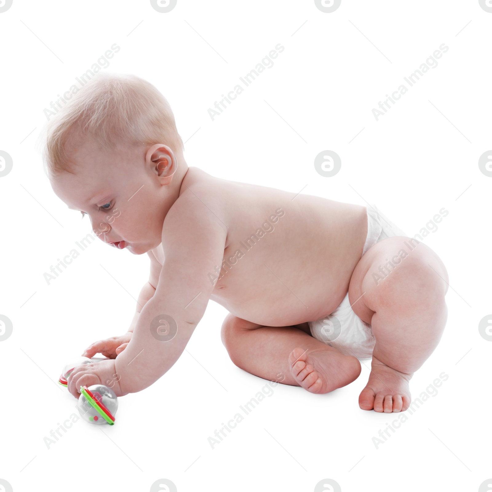 Cute little baby with rattle on white background Photo of Cute little baby with rattle on white background