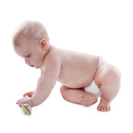 Photo of Cute little baby with rattle on white background