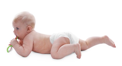 Photo of Cute little baby with rattle on white background