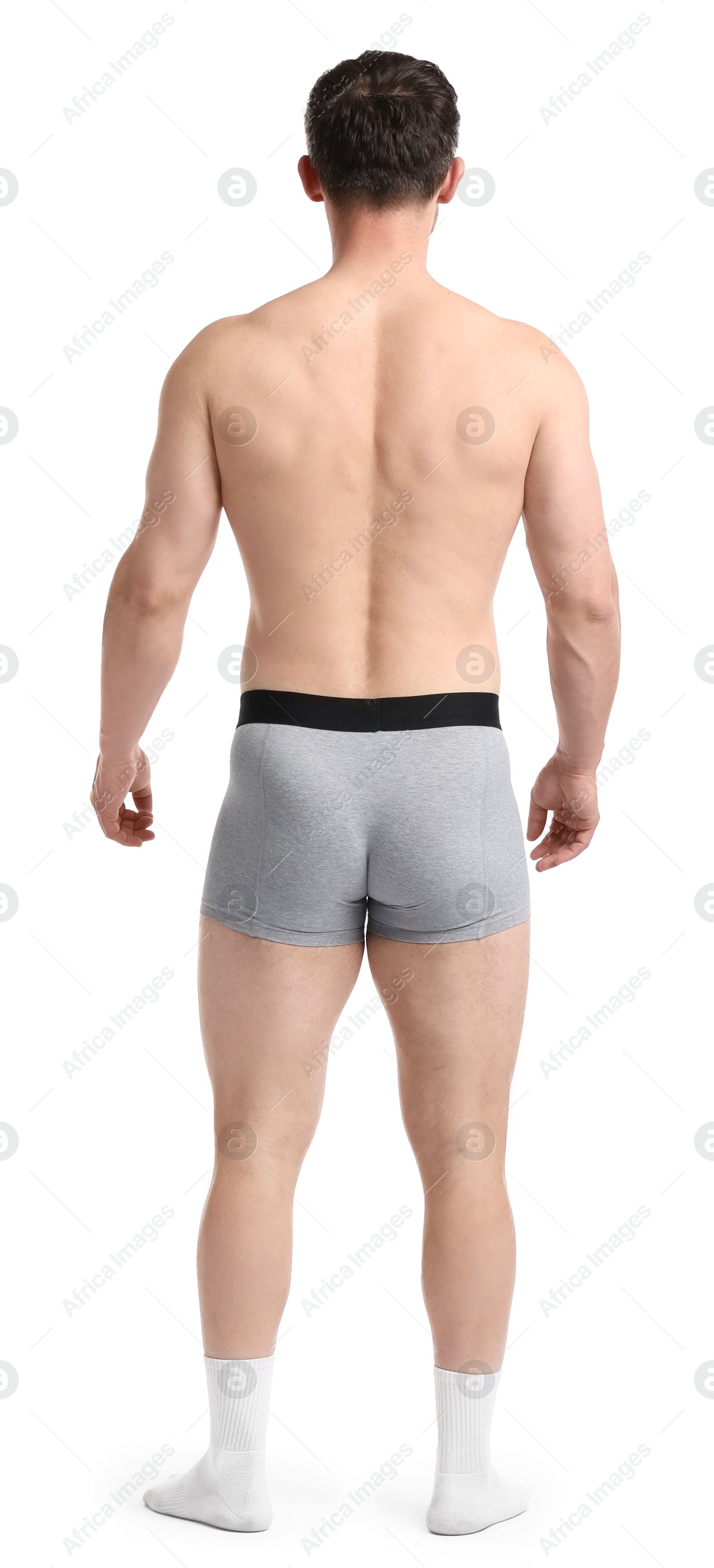 Young man in stylish light grey underwear on white background, back view Photo of Young man in stylish light grey underwear on white background, back view