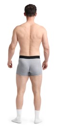Photo of Young man in stylish light grey underwear on white background, back view