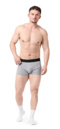Photo of Young man in stylish light grey underwear on white background