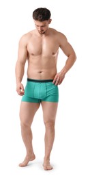 Photo of Young man in stylish turquoise underwear on white background