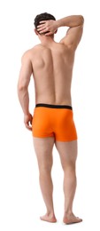 Photo of Young man in stylish orange underwear on white background, back view