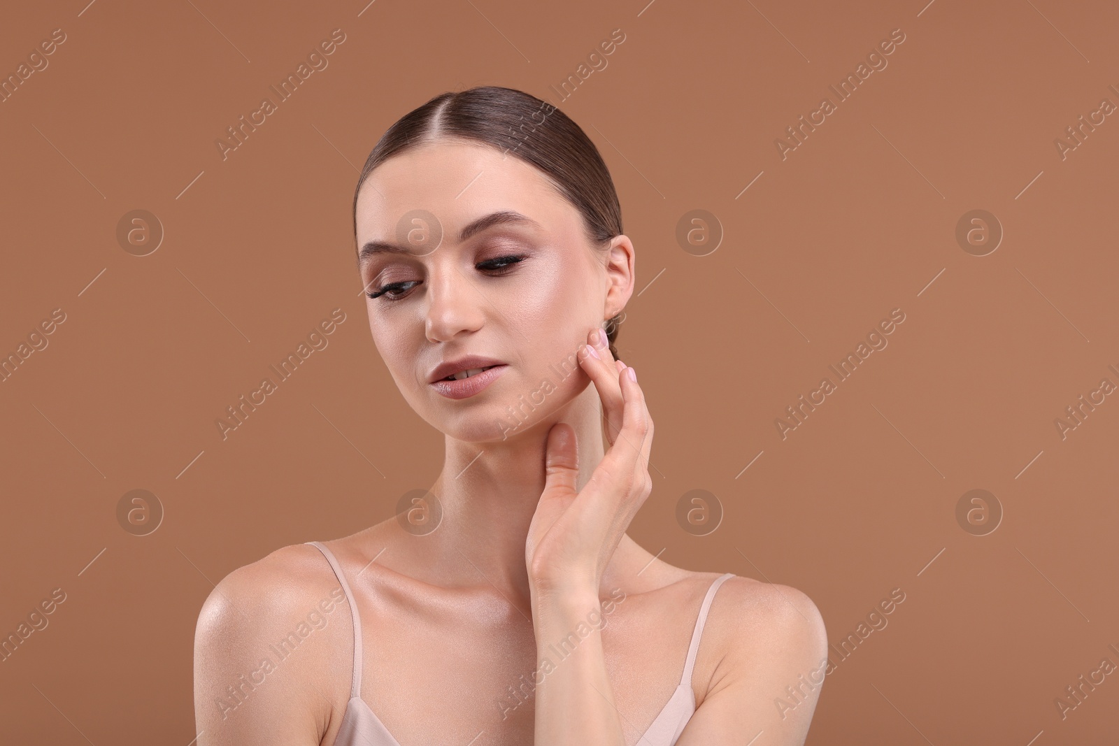 Portrait of beautiful young woman on beige background, space for text Photo of Portrait of beautiful young woman on beige background, space for text