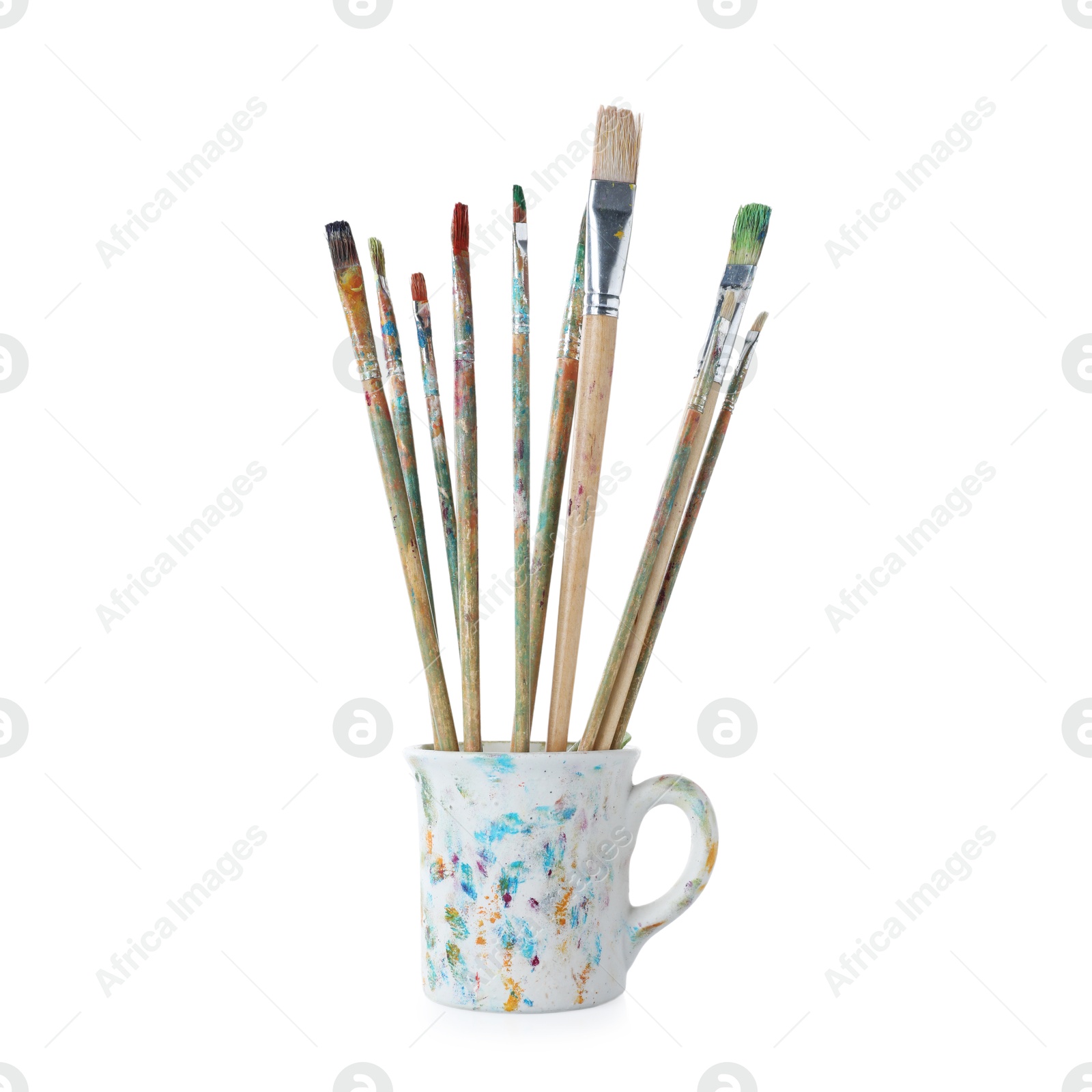 Brushes with color paints in cup isolated on white Photo of Brushes with color paints in cup isolated on white