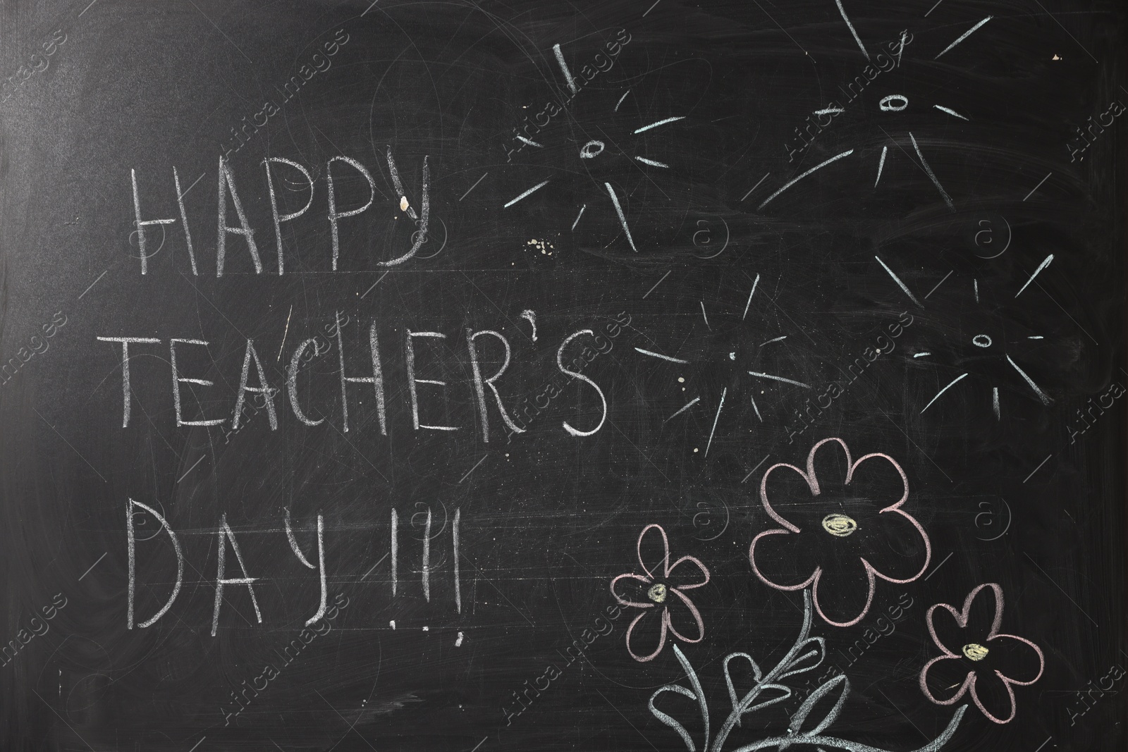 Phrase Happy Teacher’s Day with exclamation marks and drawings on blackboard Photo of Phrase Happy Teacher’s Day with exclamation marks and drawings on blackboard