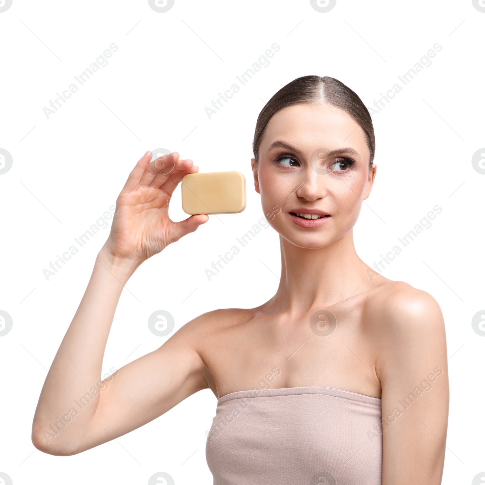 Smiling woman with soap bar on white background Photo of Smiling woman with soap bar on white background