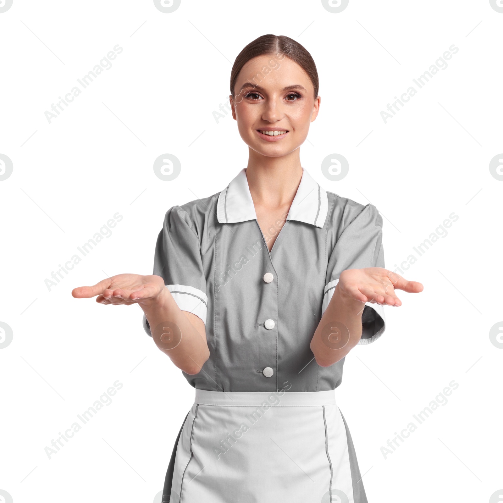 Portrait of smiling chambermaid on white background Photo of Portrait of smiling chambermaid on white background