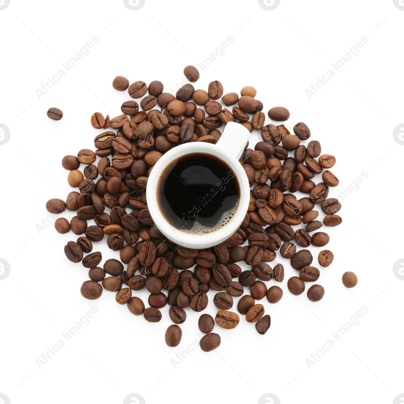 Aromatic coffee in cup and beans isolated on white, top view Photo of Aromatic coffee in cup and beans isolated on white, top view