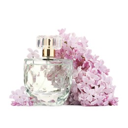 Photo of Luxury perfume and beautiful lilac flowers isolated on white