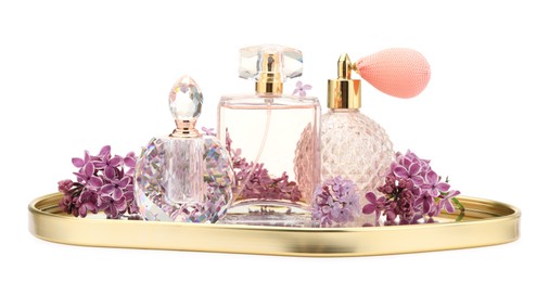 Photo of Luxury perfumes and beautiful lilac flowers isolated on white