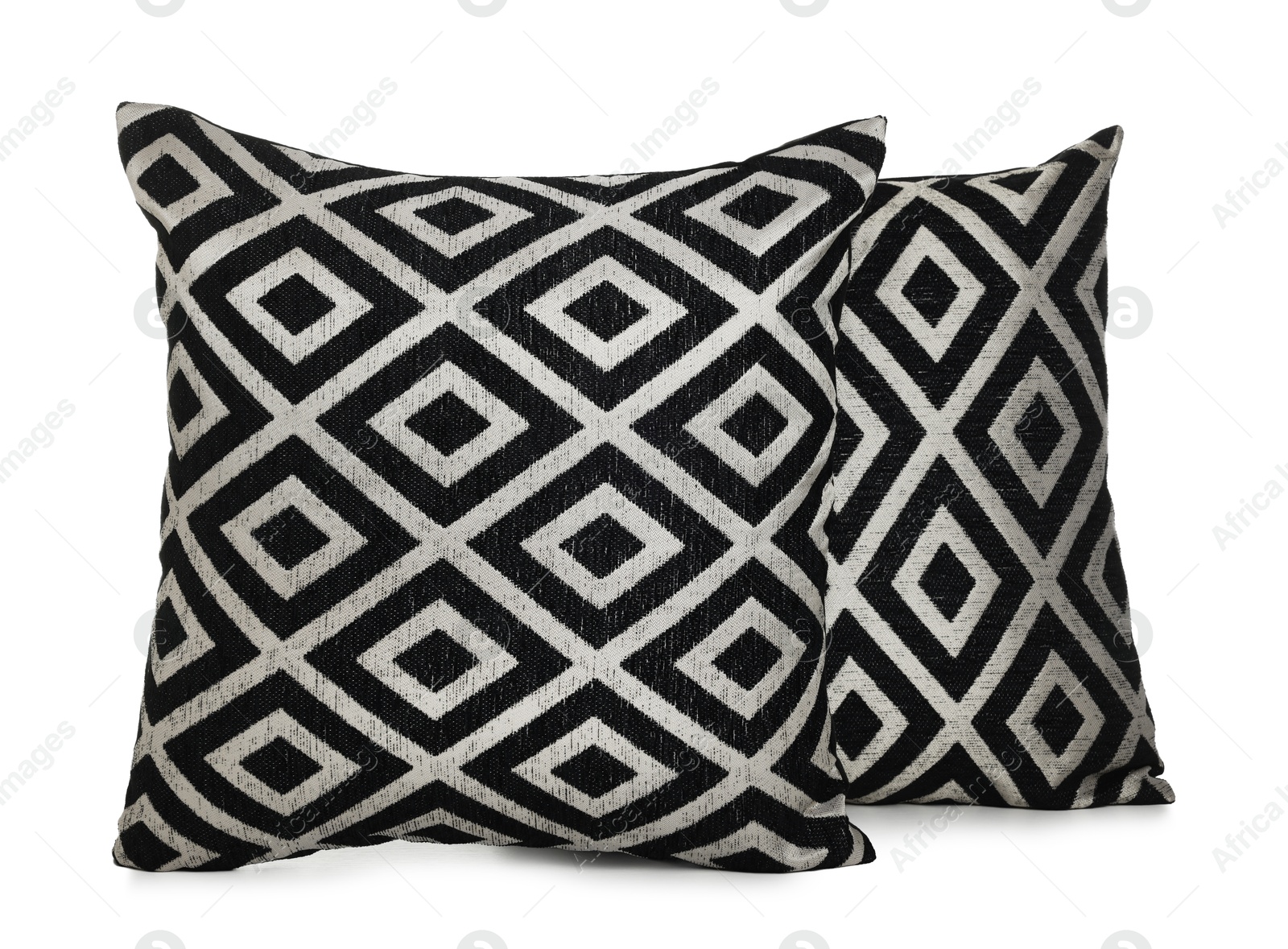 Two stylish cushions with pattern isolated on white Photo of Two stylish cushions with pattern isolated on white