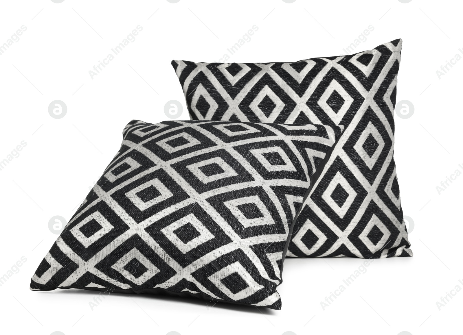 Two stylish cushions with pattern isolated on white Photo of Two stylish cushions with pattern isolated on white
