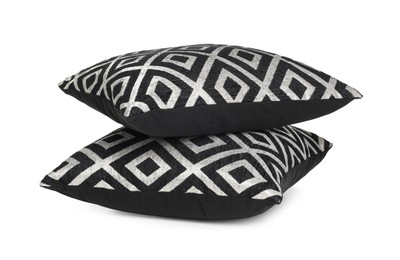 Photo of Two stylish cushions with pattern isolated on white
