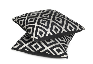 Photo of Two stylish cushions with pattern isolated on white